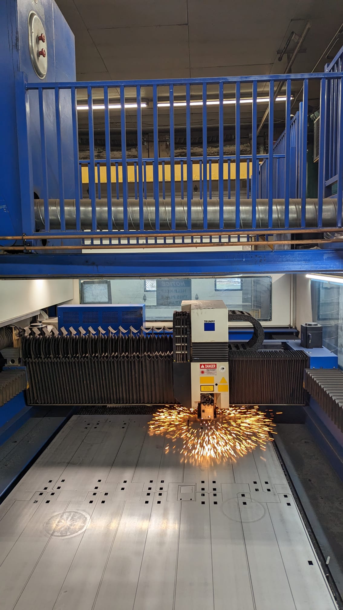 laser cutting machine with sparks